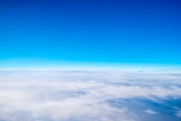 Wall Mural - blue sky and cloud (cirrocumulus)top view from airplane window,nature background