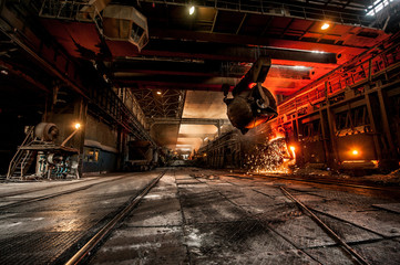 Pouring of liquid metal in open-hearth furnace