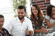 © ASDF - smiling team discussing the current problems