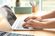 © Africa Studio - Man using laptop on table, closeup
