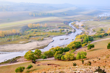 The autumn steppe sunrise landscape.