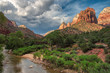 Sunset over red cliffs and Virgin river at Zion National Park, Utah, USA.