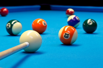 Wall Mural - Billiard pool eightball taking the shot on billiard table