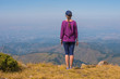 © allenkayaa - Woman looks afar in the mountains near Almaty, Kazakhstan