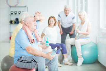 Wall Mural - Senior man after fitness classes