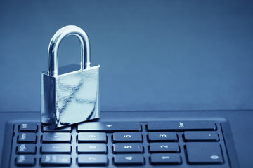Poster - Computer security concept. Padlock on computer keyboard 