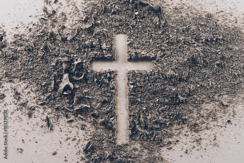 Fotomural top view of cross shape from ash on white table