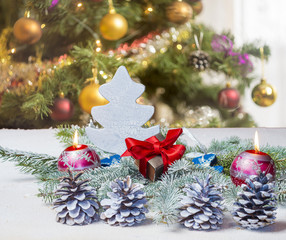 Wall Mural - christmas table background with christmas tree out of focus