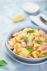 Canvas Print - pappardelle pasta with salmon in creamy sauce