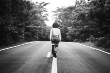 Travel Hitchhiker Woman Standing On Road Waiting For Car