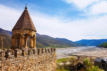 Wall Mural - Nice panoramic view of the fortress and church Ananuri, standing on the shore of the reservoir Zhinvali. Georgia