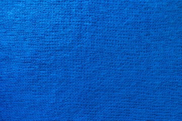 Handmade plain blue knitted fabric from above