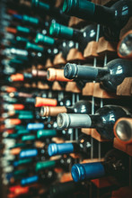 Many Dusty Wine Bottles Are On The Shelves,Racks Of Wine Bottles
