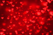 © donfiore - abstract christmas gradient red gradient background with bokeh glitter and red hearts shape flowing, valentine day love relationship holiday event festive concept