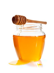 Wall Mural - glass jar full of honey and dipper