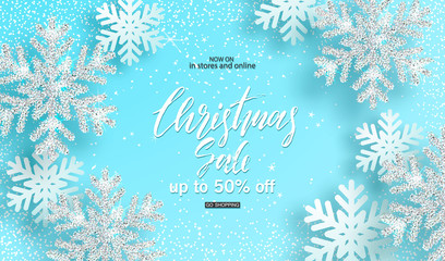 Christmas sale. Background with shiny silver snowflakes on blue background. Design for invitation, banners, ads, coupons, promotional material. Vector illustration