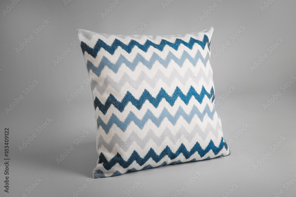 Soft pillow on light background