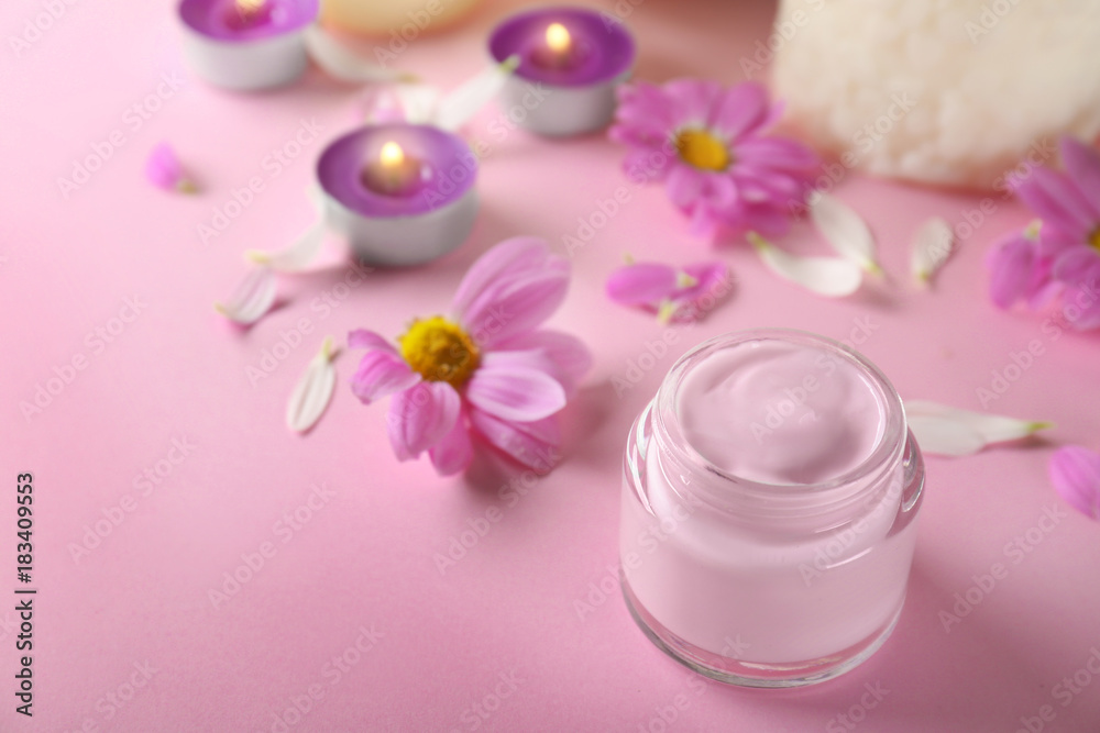 Beautiful composition with jar of body cream on color background