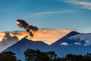 Orange sunset behind two volcanoes, Guatemala