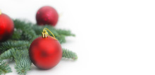Isolated Fir Branches With Christmas Red Tree Balls With Copy Paste. Baner.
