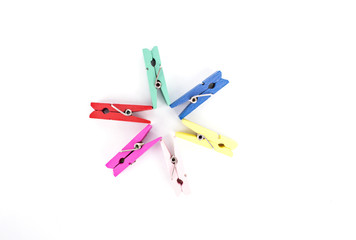 multicolor cloth wooden clamp on white background