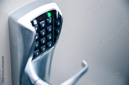 Door handle with modern electronic combination lock Poster Mural XXL
