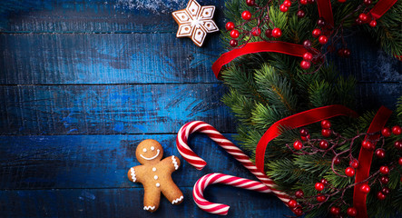 Wall Mural - christmas holidays ornament at vintage wooden background; christmas flat lay background