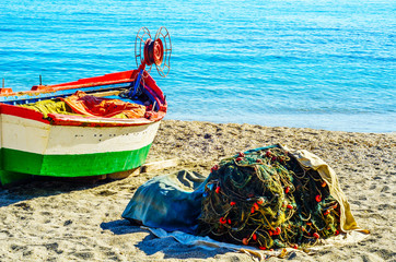 Old boat on the shore on the sand, vacation, beach for tourists