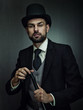 © Dmytro Tolokonov - Englishman detective, retro style male portrait