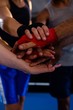 © WavebreakMediaMicro - Close-up of boxers stacking hands