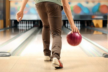 Wall Mural - Young man at bowling club