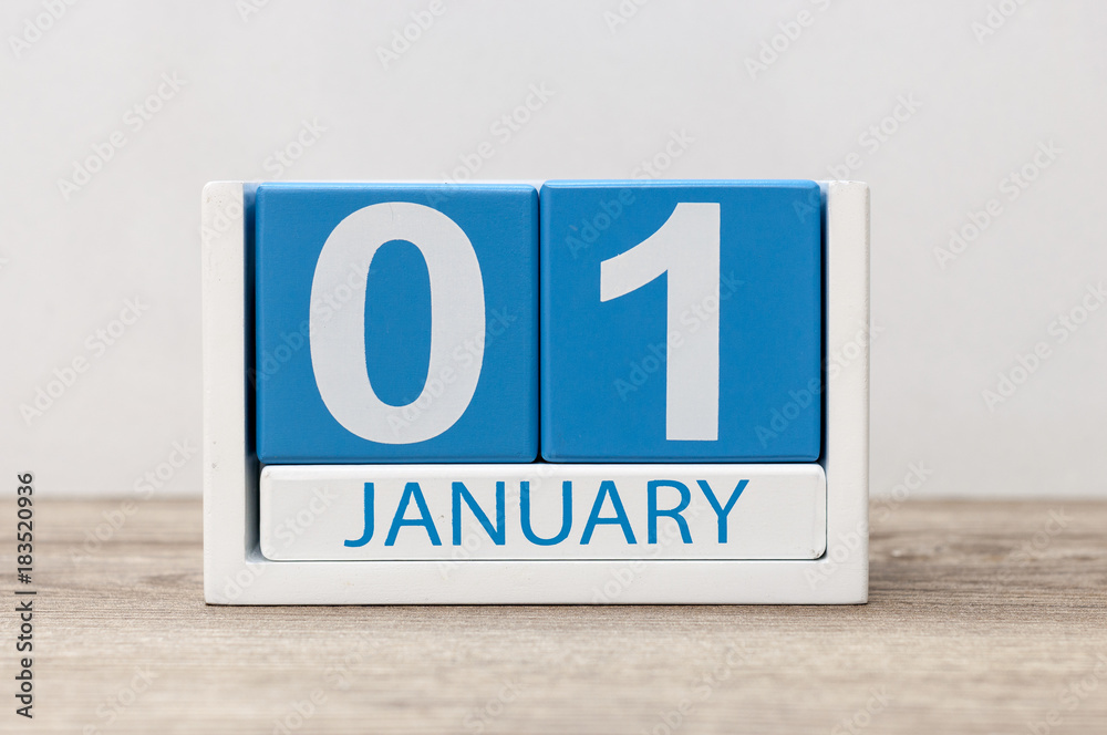 Photo Stock January 1st. Day 1 of january month, calendar on light background. Happy New year, Winter time | Adobe Stock