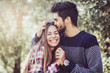 © Mediteraneo - Happy couple in love having fun outdoors and smiling.