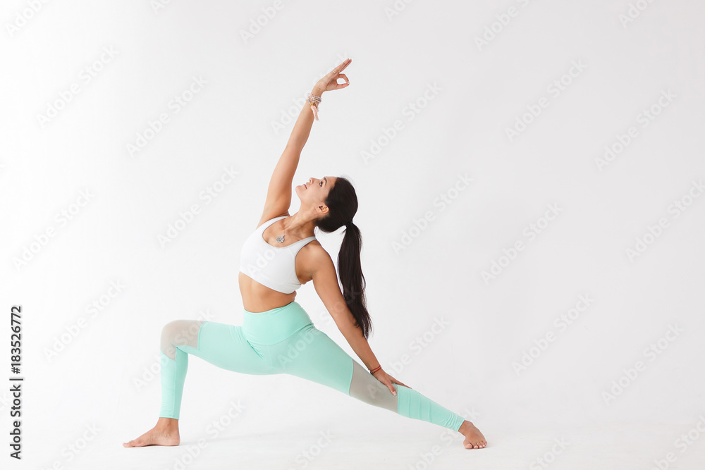 Beautiful young woman doing yoga - obrazy, fototapety, plakaty 