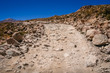 Mountain road formed of large rocks, stones and boulders