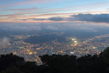 Wall Mural - Panoramic view of Caracas city, at night, from a lookout in Avila mountain