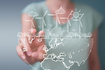 Wall Mural - Businesswoman touching and holding renewable energy sketch