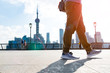 walking man in the summer at bund Shanghai city view background