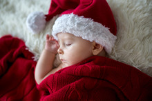 Little Sleeping Newborn Baby Boy, Wearing Santa Hat