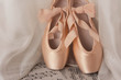 Ballet point shoes on music sheet