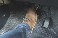 Close Up Leather Shoe Ob Pedal In Car