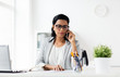 © Syda Productions - businesswoman calling on smartphone at office