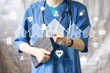 Doctor pushing button house home icon virtual healthcare network on virtual panel.