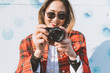 © Eugenio Marongiu - young woman outdoors using camera - photographer, creative, positive emotions concept
