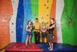 © Africa Studio - Young people in climbing gym