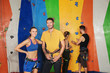 © Africa Studio - Young people in climbing gym