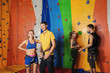 © Africa Studio - Young people in climbing gym