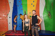 © Africa Studio - Young people in climbing gym