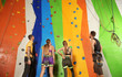 © Africa Studio - Young people in climbing gym