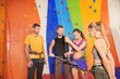 © Africa Studio - Young people in climbing gym